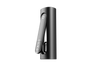 PAX FLOW portable vaporizer with matte-black cylindrical body, hinged mouthpiece featuring the PAX logo; designed for dry herb and concentrate use.