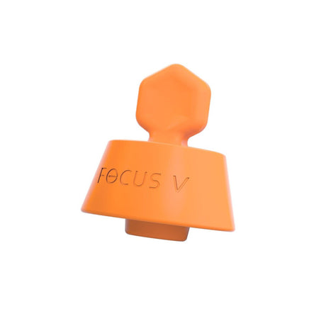 Focus V Chromatix Silicone Stopper, an orange hexagon-shaped accessory, designed to protect CARTA E-Rig from dust and spills, visible with engraved text.
