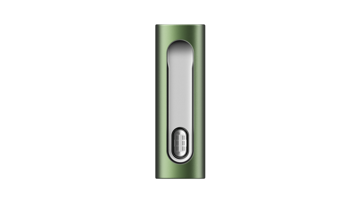 PAX FLOW: Compact, green anodized-aluminum dry herb vaporizer with a recessed silver face and USB-C-like connector at the base for charging.