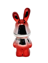 Grinder - Lost Bunny: A sleek, metallic rabbit-shaped grinder with a smooth, reflective finish, showcasing a modern design for decorative and functional use.