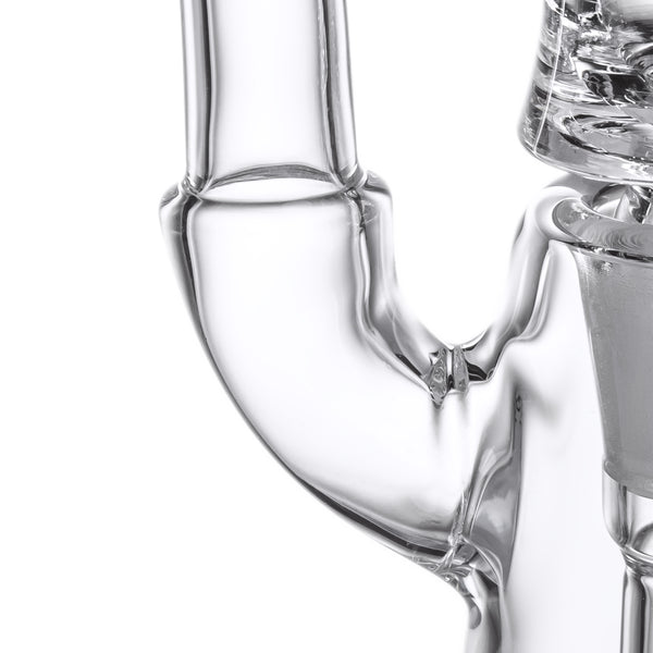 Lumina - Clear: Close-up of MJ Arsenal Lumina Bubbler's U-bend glass tubing with fitted bowl, showcasing its sleek design and borosilicate glass construction.