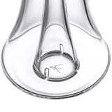 Close-up of the Lumina - Clear glass component, showcasing its circular base with notches and engraved logo, part of the MJ Arsenal Lumina Bubbler assembly.