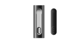 PAX FLOW components: Left, charging dock with sliding door; right, slim battery/pod unit with LED, showcasing PAX's advanced vaporizer design and functionality.