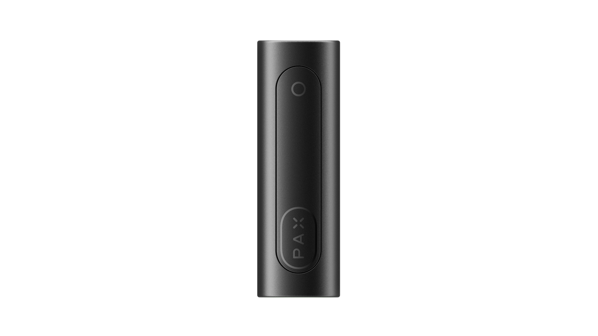 PAX FLOW black portable vaporizer battery with pill-shaped design, circular LED button, and oval logo button, highlighting advanced dry herb vaporization technology.