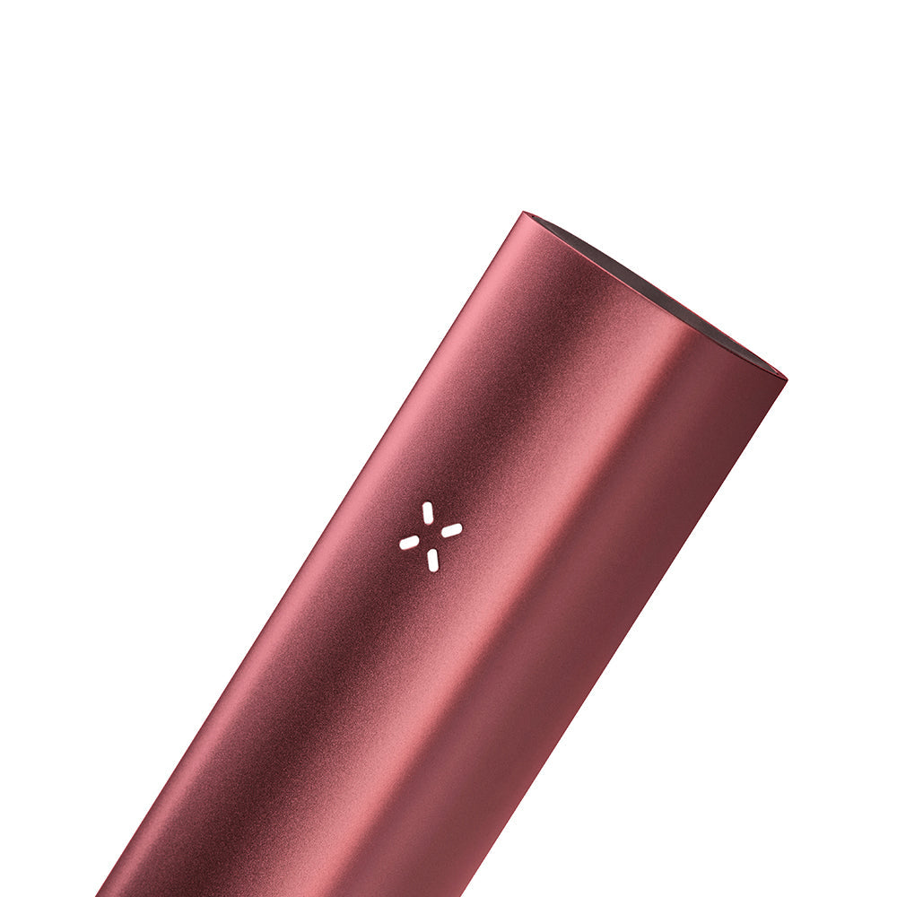 PAX 3 Basic Kit: Sleek, metallic-red vaporizer with a four-petal LED indicator, designed for vaporizing dry herbs with app-controlled temperature settings.