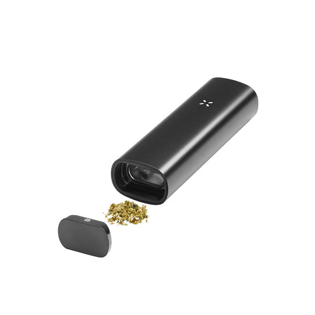 PAX 3 Basic Kit: Sleek black handheld vaporizer with mouthpiece removed, next to a small pile of ground cannabis, emphasizing portable, efficient dry-herb vaping.