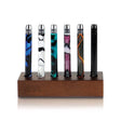 One Hitter Display Stand holding multiple pens, showcasing its capacity and wooden construction. Designed for organizing various One Hitters efficiently.