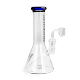 8 Tall Concentrate Beaker Bong with cobalt-blue lip, clear glass, fixed joint, and quartz banger for dabbing; durable borosilicate glass construction.