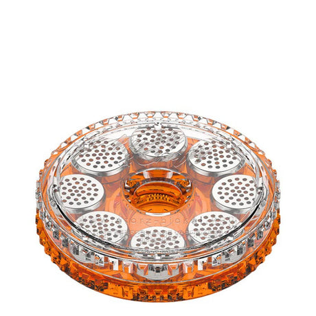 Round container with metal holes, identified as Dosing Capsule Magazine, designed for storing pre-filled herb capsules for efficient, clean vaping sessions. Includes one magazine, eight capsules.