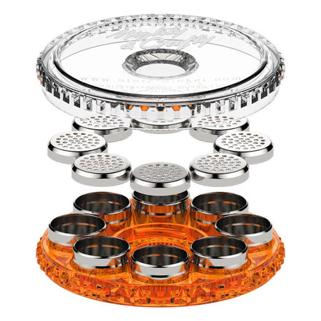 Dosing Capsule Magazine with clear and orange container, silver metal holes, designed for pre-filling and storing vaping capsules for efficient herb sessions.