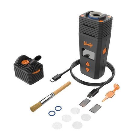VENTY Dry Herb Vaporizer with cord and brush, featuring adjustable airflow and rapid heat-up, designed for superior vapor performance. Includes USB-C cable and accessories.