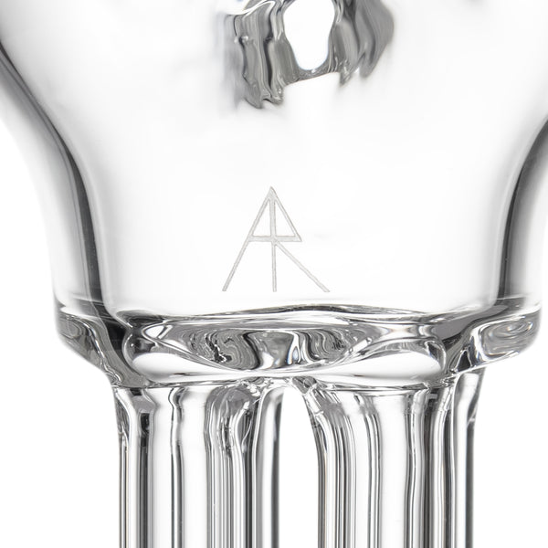 Close-up of Tetra - Clear, showcasing borosilicate glass tree percolator's slotted legs and etched AR logo, highlighting its sleek, modern design collaboration with Andy Roth.