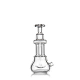 Tetra - Clear glass dab rig features a beaker base, two vertical percolator chambers, and a flared mouthpiece, showcasing a sleek, modern design for vaporizing.