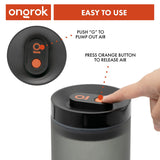 A finger activates the vacuum-sealed lid of the Airtight Vacuum Pump Storage Jar - Glass - 800ml, showcasing its UV-resistant, frosted design for preserving herbs.