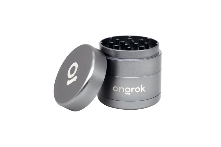 Mini EZ Grinder - 55mm showing its interlocking teeth inside, crafted from durable aircraft-grade aluminum, designed for efficient herb and spice grinding.
