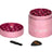 Mini EZ Grinder - 55mm with pink metal body, includes a tiny brush and plastic scraper for cleaning and efficient herb grinding and storage.