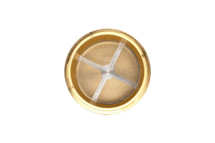 Mini EZ Grinder - 55mm features a circular metal-mesh filter within a brass ring, supported by three spokes, ensuring efficient debris-free grinding.