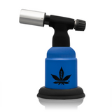 5 Blow Torch Turbo Flame with black nozzle and blue canister, featuring a cannabis-leaf logo and silicone boot, ideal for consistent heating tasks.