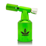 5 Brass Blow Torch with Blue Turbo Flame on metallic green canister, featuring cannabis-leaf logo; sleek, compact design for versatile, powerful heating applications.