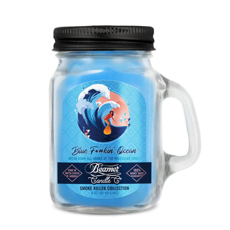 Scented Candle - Blue F*#kin' Ocean in a glass jar with a black lid, featuring odor-eliminating enzymes and a 22-hour burn time.