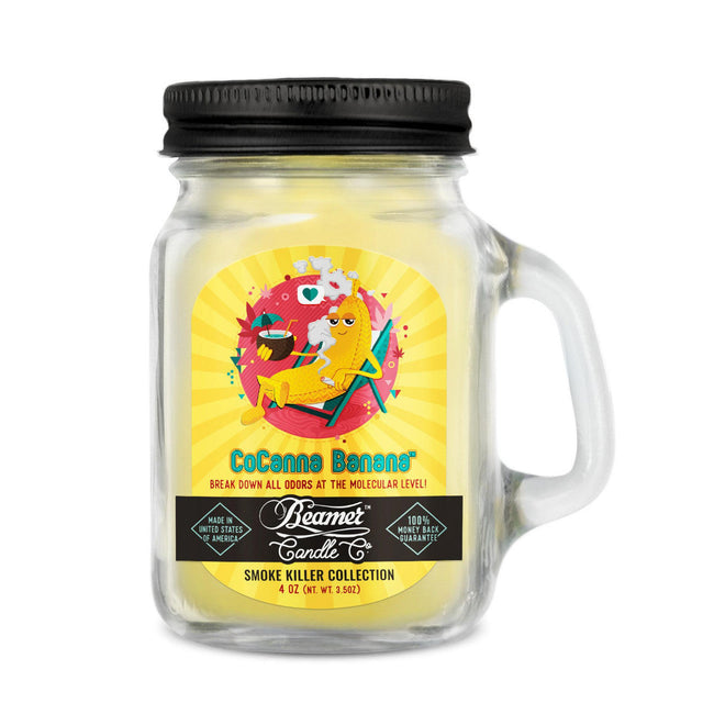 Scented Candle - CoCanna Banana in a glass jar with a black lid, featuring a cartoon banana design, designed to neutralize odors with a 22-hour burn time.