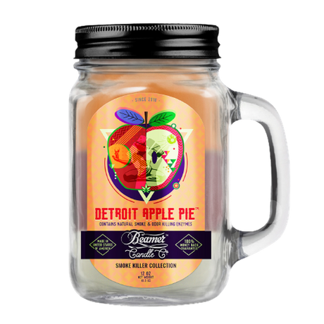 Scented Candle - Detroit Apple Pie in a glass jar with lid and apple design, featuring odor-eliminating enzymes and a 90-hour burn time.