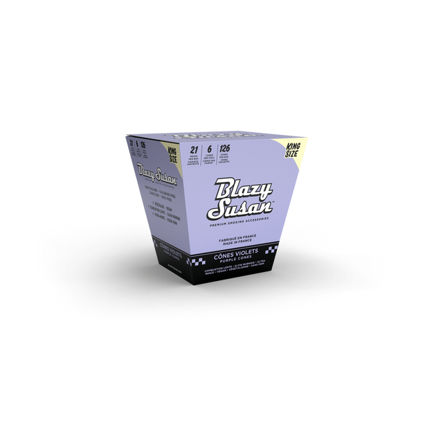 Blazy Susan Purple King Size Cones Full Box, featuring 63 vegan, ultra-thin, slow-burning pre-rolled cones with filters, highlighted on lavender trapezoidal packaging.
