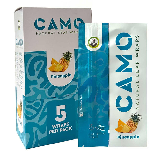 Chamomile Wraps - Pineapple - Carton of 25: Close-up of resealable foil packs and box, showcasing pineapple-themed packaging for tobacco-free, plant-based wraps.