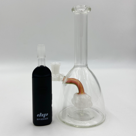 Dip Devices Aster flower vaporizer on the side of a bong