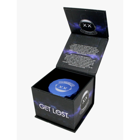 Packaging of the Aluminum Diamond Crusher Grinder - Purple & Blue, featuring its black box with galaxy print and visible bright blue aluminum grinder inside.