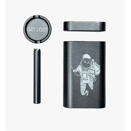 Metal Dugout Grinder: four matte-black aluminum pieces including a screw-on lid, magnetic lid, one-hitter tool, and dugout box with astronaut graphic, GET LOST text.