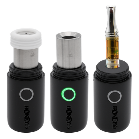 HoneyStick Lil Ripper E-Rig, a black and silver portable vaporizer with visible glass mouthpiece, designed for wax and dry herb use.