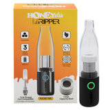 HoneyStick Lil Ripper E-Rig in packaging, showcasing its sleek black and silver design with accessories visible, tailored for wax and dry herb vaping.