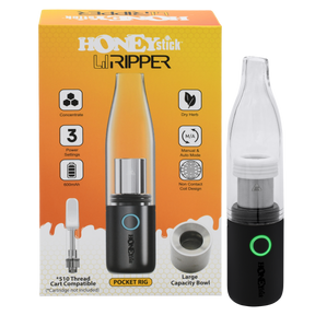 HoneyStick Lil Ripper E-Rig in packaging, showcasing its sleek black and silver design with accessories visible, tailored for wax and dry herb vaping.