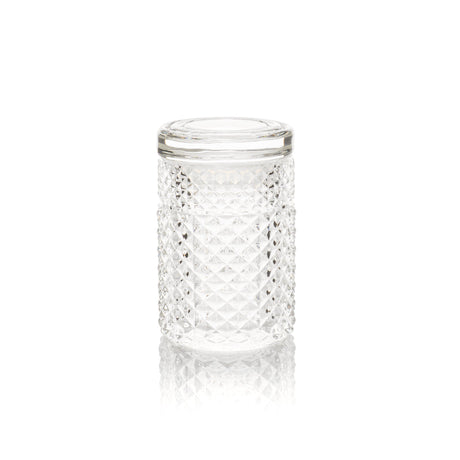 Twenties Collection Stash Jar: Clear glass jar with diamond-cut texture and fitted lid, designed for durability and elegance in everyday use.