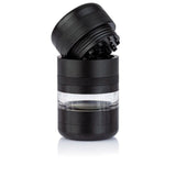 GR8TR Jar Body Grinder 2.2 features a multi-piece, cylindrical design with sharp teeth, sifting chamber, and collection base for efficient herb grinding.