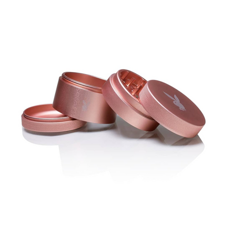 Close-up of PLAYBOY x Kannastor 2.2 Grinder in rose gold, showcasing its sleek 4-piece modular design and premium collaboration branding.