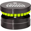 Compact Kief Sweeper Brush: small, two-piece cylindrical tool with lime-green bristles, designed to scrape and collect kief efficiently from herb grinders. Durable aluminum, twist-to-clean design.