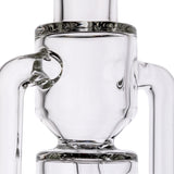 Close-up of the Apex Mini Rig from the Alpine Collection, showcasing its clear borosilicate glass with double uptake recycler system and sleek design.