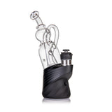 Lasso Peak Attachment: A desktop e-rig with a black base, clear glass water chamber, and elegant looping recycler pathways for smooth, flavorful vaporization.