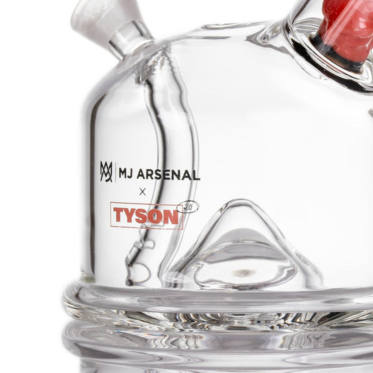 Close-up of MJA x Tyson 2.0 Punch-Out Bubbler, showcasing its clear glass, rounded base, joint for attachments, and printed logos. Compact, durable design for smooth, powerful sessions.