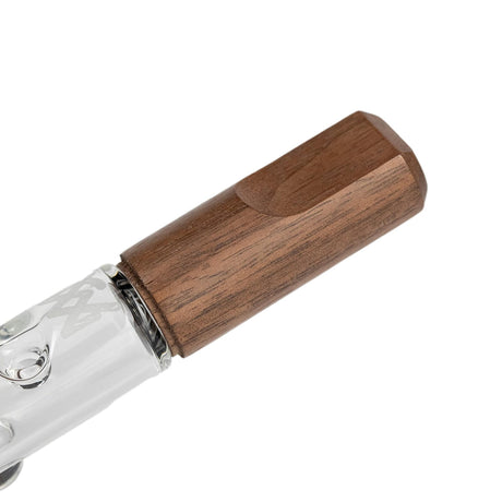 Ridge Chillum - Alpine Collection: Close-up of a clear glass tool with decorative bubbles, joined to a faceted wooden mouthpiece, showcasing premium craftsmanship.