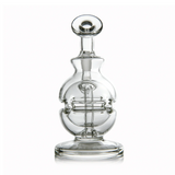 Royale Mini Dab Rig - Clear: A compact, clear-glass tabletop bubbler with a round base, bulbous chamber, internal percolator, and straight neck with rounded mouthpiece.
