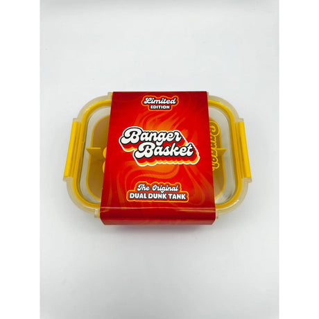Banger Basket container with sealable lid, two compartments, and red label, designed for cleaning dabbing tools efficiently with included banger baskets.