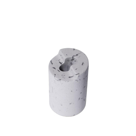 Anchor Lighter Holder: A solid cylindrical block of marbled concrete with a kidney-bean-shaped hollow, designed to securely hold a standard full-sized pocket butane lighter.