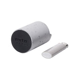 Anchor Lighter Holder: A minimalist, cylindrical concrete ashtray with a branded base, featuring a notch for lighter placement, shown beside a white lighter for scale.