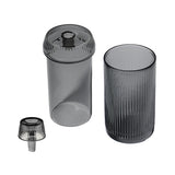 Deco Gravity Bong: Three-piece set of vertically ribbed glassware, featuring a tall tumbler, matching canister, and small stopper, showcasing Art Deco design and modern functionality.