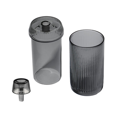 Deco Gravity Bong: Three-piece set of vertically ribbed glassware, featuring a tall tumbler, matching canister, and small stopper, showcasing Art Deco design and modern functionality.