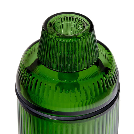 Deco Gravity Bong featuring a green ribbed-glass body with a screw-on top, black sealing ring, and fluted design, blending vintage elegance with modern functionality.