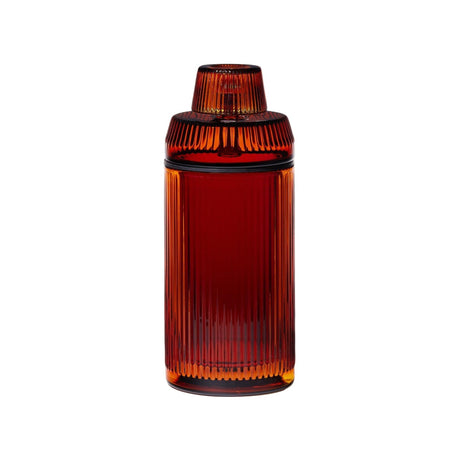 Deco Gravity Bong in ribbed, deep amber-red glass, showcasing Art Deco style with a matching lid, highlighting its vintage elegance and modern functionality.